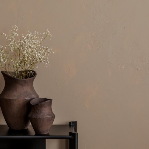 a vase with white flowers