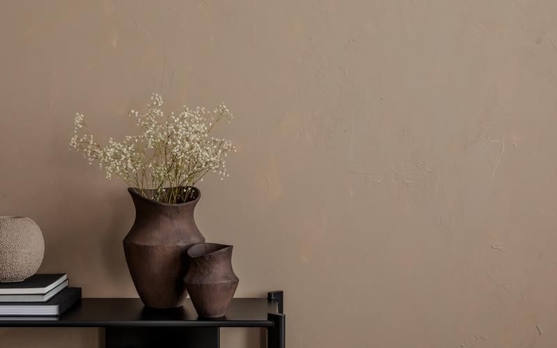 a vase with white flowers