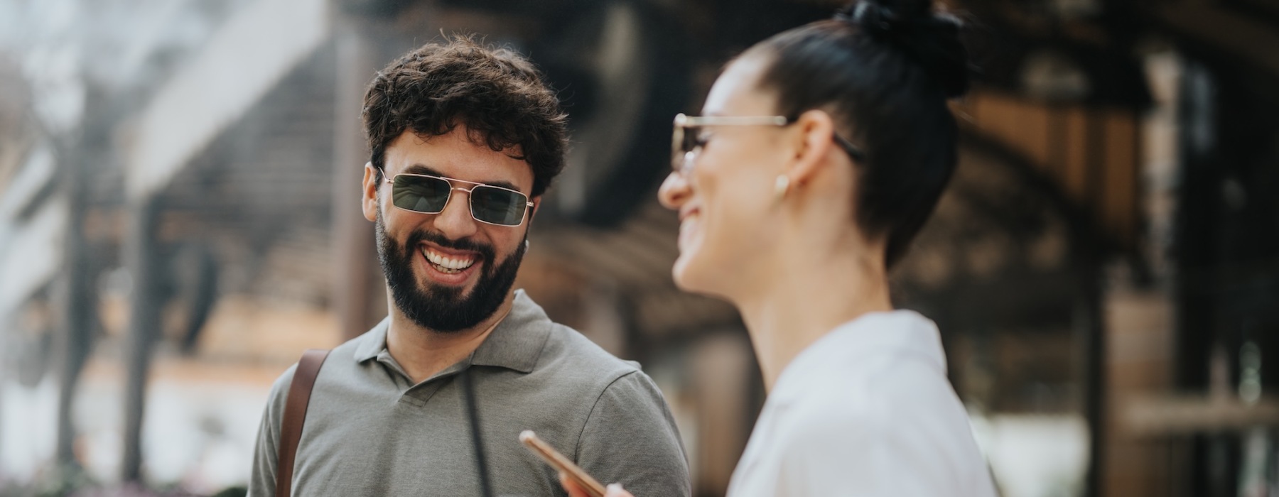 a couple of people talking and laughing