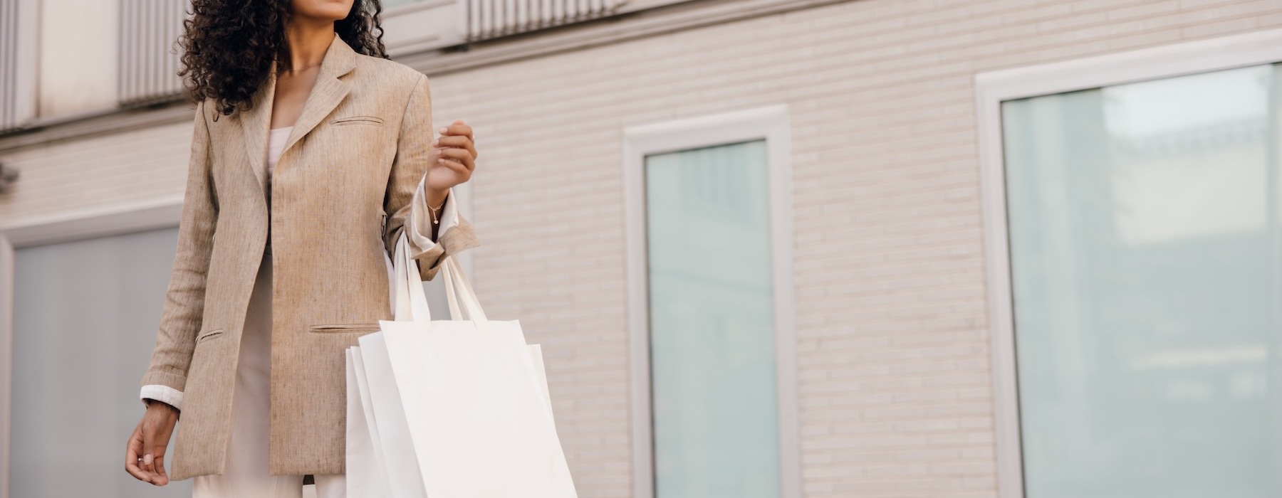 a person carrying a shopping bag