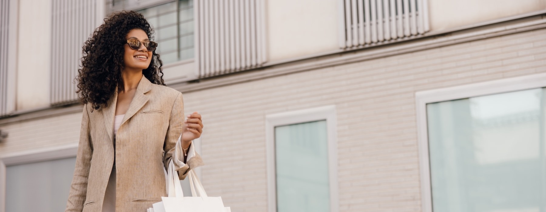 a person carrying a shopping bag